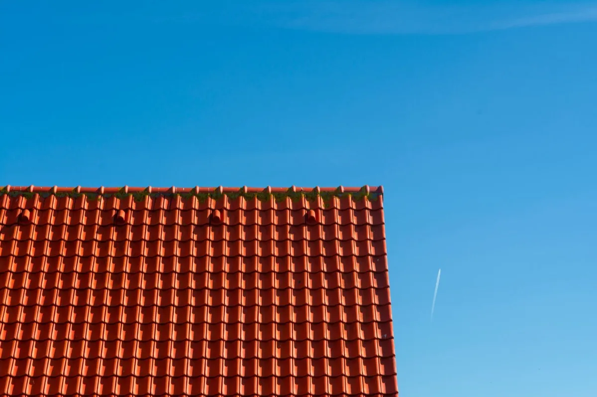 Tile roof gable in full sun, the kind of exposure that sets roof life in Waco, TX